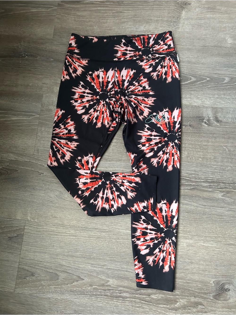 Nike Dri Fit black leggings with red & pink burst print